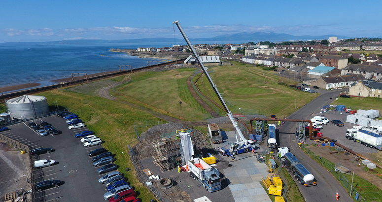 Thee new lining is lowered into place by a giant crane Saltcoats Sewer Investment