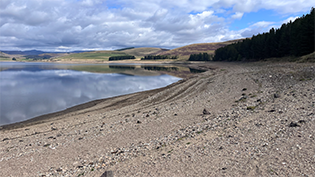 Backwater Reservoir Low view of Backwater Reservoir levels very low