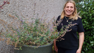 Resident Katie Gibson with one of her new water butts