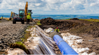 Pipe laying on the Fenwick Moor Pipe laying on the Fenwick Moor