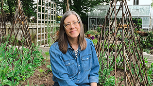 Julianne Robertson Save Water in the Garden Blog 3 Gardening Influencer Julianne Robertson sitting in her garden