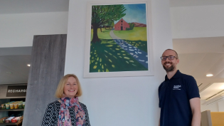 Image of local artist's painting displaying in FMH