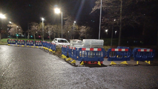 Customers collecting water from a temp water station
