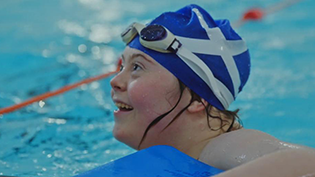 Learn to Swim celebrates World Downs Syndrome Day Swim to Swim Cerys McCrindle in the pool for Learn to Swim