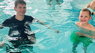Learn to Swim Jack Clews Young Jack Clews in the pool with Learn To Swim teacher Nathan McKechnie during an ASN class