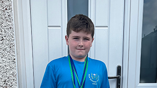 Learn to Swim Callan Johnston Young Learn to Swim student Callan Johnston head and shoulders