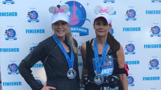 Lesley (left) Julie (right) pictured with their medals on after completing the Disneyland Paris Half Marathon in 2019.